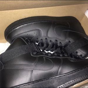 Nike Air Force 1’s black high tops